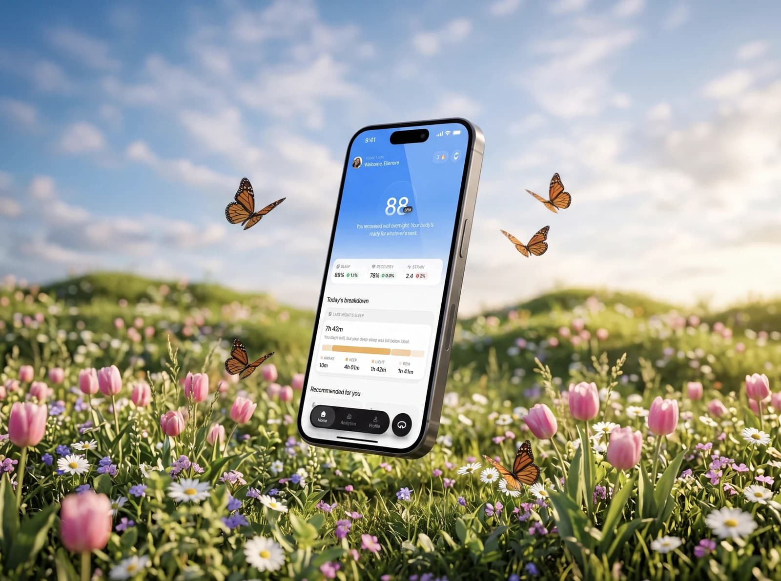 Luma health app on a phone floating over a field of tulips